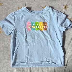 Care Bears Light Blue Crop Top with Colorful Characters